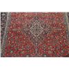 Image 4 : A WOOL HAND KNOTTED FLORAL ORIENTAL AREA RUG.