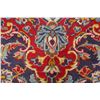 Image 12 : A WOOL HAND KNOTTED FLORAL ORIENTAL AREA RUG.