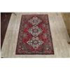 Image 2 : A WOOL HAND KNOTTED MEDALLION AREA RUG.
