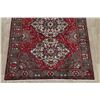 Image 5 : A WOOL HAND KNOTTED MEDALLION AREA RUG.