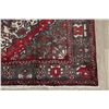 Image 6 : A WOOL HAND KNOTTED MEDALLION AREA RUG.