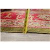 Image 11 : A WOOL HAND KNOTTED OUSHAK AREA RUG.
