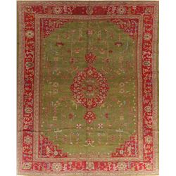 A WOOL HAND KNOTTED OUSHAK AREA RUG.