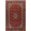 Image 1 : A WOOL HAND KNOTTED FLORAL MEDALLION AREA RUG.