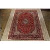 Image 2 : A WOOL HAND KNOTTED FLORAL MEDALLION AREA RUG.