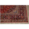 Image 6 : A WOOL HAND KNOTTED FLORAL MEDALLION AREA RUG.