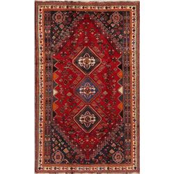 A WOOL HAND KNOTTED ORIENTAL AREA RUG.