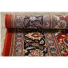 Image 12 : A WOOL HAND KNOTTED FLORAL ORIENTAL AREA RUG.