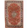 Image 1 : A WOOL HAND KNOTTED FLORAL ORIENTAL AREA RUG.