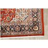 Image 4 : A WOOL HAND KNOTTED FLORAL ORIENTAL AREA RUG.