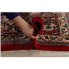Image 12 : A WOOL HAND KNOTTED ORIENTAL AREA RUG.