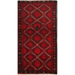 A WOOL HAND KNOTTED BALOUCH ORIENTAL RUG.