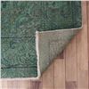 Image 7 : A WOOL HAND KNOTTED FLORAL AREA RUG.
