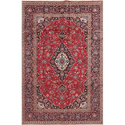A WOOL HAND KNOTTED FLORAL ORIENTAL AREA RUG.