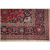 Image 6 : A WOOL HAND KNOTTED FLORAL ORIENTAL AREA RUG.