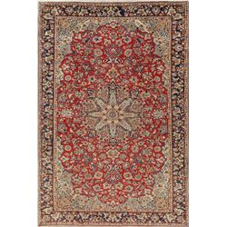 A WOOL HAND KNOTTED ORIENTAL AREA RUG.