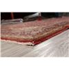 Image 10 : A WOOL HAND KNOTTED FLORAL ORIENTAL AREA RUG.
