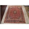 Image 1 : A WOOL HAND KNOTTED FLORAL ORIENTAL AREA RUG.