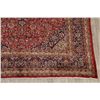 Image 5 : A WOOL HAND KNOTTED FLORAL ORIENTAL AREA RUG.