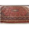 Image 8 : A WOOL HAND KNOTTED FLORAL ORIENTAL AREA RUG.
