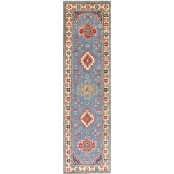 A WOOL HAND KNOTTED KAZAK ORIENTAL RUG RUNNER.