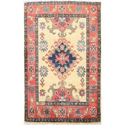A WOOL HAND KNOTTED KAZAK ORIENTAL AREA RUG.