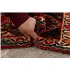 Image 12 : A WOOL HAND KNOTTED ORIENTAL AREA RUG.
