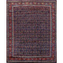 A WOOL HAND KNOTTED ORIENTAL AREA RUG.
