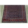Image 5 : A WOOL HAND KNOTTED ORIENTAL AREA RUG.