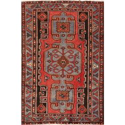 A WOOL HAND KNOTTED ORIENTAL AREA RUG.