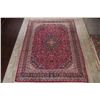 Image 2 : A WOOL HAND KNOTTED FLORAL KASHMAR AREA RUG.
