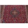 Image 4 : A WOOL HAND KNOTTED FLORAL KASHMAR AREA RUG.