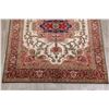 Image 4 : A WOOL HAND KNOTTED FLORAL ORIENTAL AREA RUG.