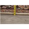 Image 11 : A WOOL HAND KNOTTED FLORAL ORIENTAL AREA RUG.