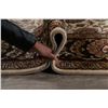 Image 12 : A WOOL HAND KNOTTED FLORAL ORIENTAL AREA RUG.