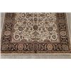 Image 5 : A WOOL HAND KNOTTED FLORAL ORIENTAL AREA RUG.
