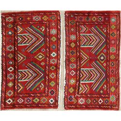 A WOOL HAND KNOTTED BOKHARA ORIENTAL RUGS.