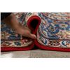 Image 12 : A WOOL HAND KNOTTED FLORAL ORIENTAL AREA RUG.