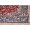 Image 2 : A WOOL HAND KNOTTED FLORAL ORIENTAL AREA RUG.