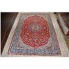 Image 3 : A WOOL HAND KNOTTED FLORAL ORIENTAL AREA RUG.