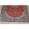 Image 6 : A WOOL HAND KNOTTED FLORAL ORIENTAL AREA RUG.