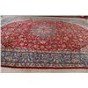 Image 9 : A WOOL HAND KNOTTED FLORAL ORIENTAL AREA RUG.