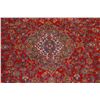 Image 4 : A WOOL HAND KNOTTED FLORAL ORIENTAL AREA RUG.