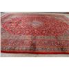 Image 9 : A WOOL HAND KNOTTED FLORAL ORIENTAL AREA RUG.
