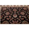 Image 11 : A WOOL HAND KNOTTED FLORAL ORIENTAL AREA RUG.