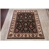 Image 2 : A WOOL HAND KNOTTED FLORAL ORIENTAL AREA RUG.