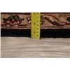 Image 9 : A WOOL HAND KNOTTED FLORAL ORIENTAL AREA RUG.
