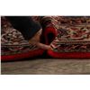 Image 12 : A WOOL HAND KNOTTED FLORAL ORIENTAL AREA RUG.