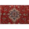 Image 4 : A WOOL HAND KNOTTED FLORAL ORIENTAL AREA RUG.