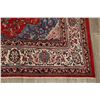 Image 6 : A WOOL HAND KNOTTED FLORAL ORIENTAL AREA RUG.